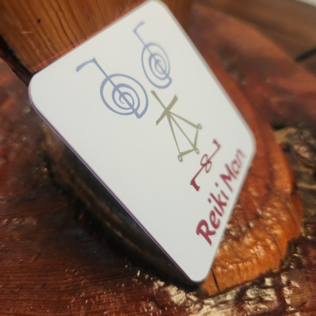 Minimalist Reiki Man business card featuring sacred Reiki symbols with rounded corners and a clean spiritual design